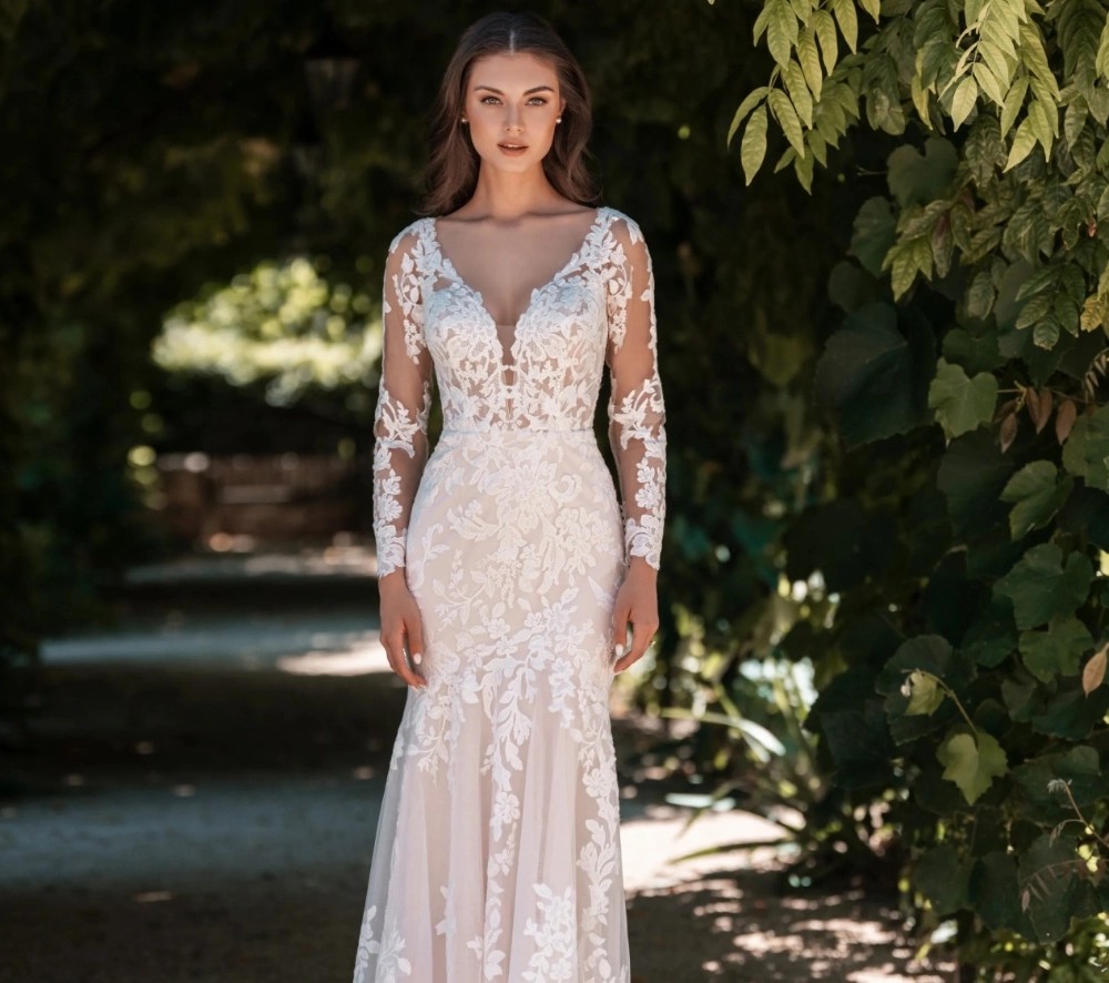 Lovely in Lace Blonde Bride Wearing Allure Lace Wedding Dress