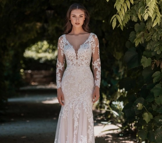 Lovely in Lace Blonde Bride Wearing Allure Lace Wedding Dress